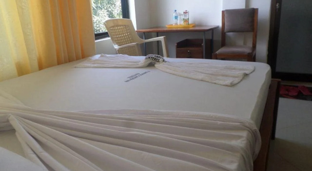 Flamingo Garden Inn & Hotel, Buchen Sie Hotel Hotels in Daressalam mit Parkplatz, Parkplätze