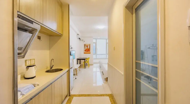 Апартаменты WeiHai Emily's Holiday Apartment