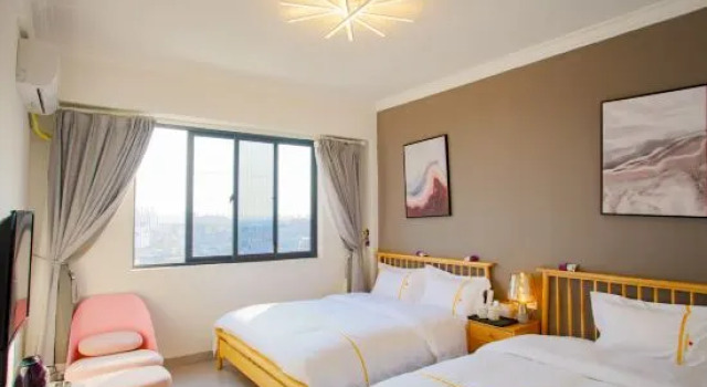 Кровать в общем номере Dongshan British Earl Meiju Homestay (Nanmen Bay)