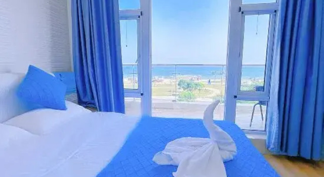 Люкс Deluxe с 2 комнатами с видом на море Lanyawan Seaview Apartment (Dongdaihe Platinum Sea Branch)