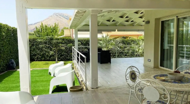 Апартаменты Borgo Aranci - Appartamento in Villa Orchidea - 12A
