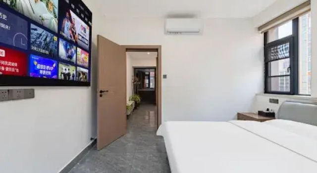 Люкс Meicheng Hotel (Xinyang Daxin Guizhuyuan Branch)