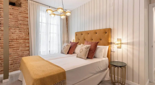 Апартаменты Apartamentos Puerta Elvira Suites 3000