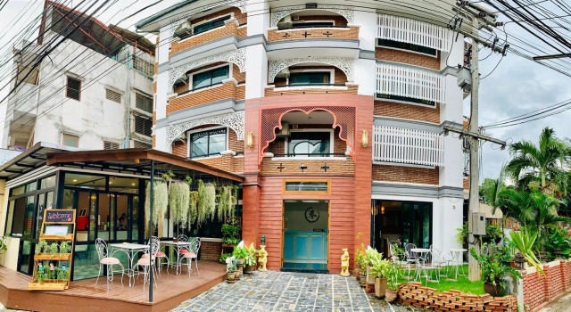 Кровать в общем номере TJR Boutique Hotel