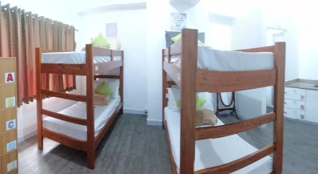 Кровать в общем номере BSA Tower Serviced Residences