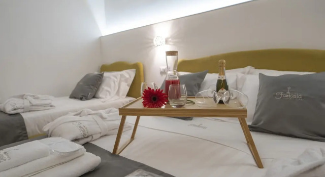 Четырёхместный номер Luxury Dimora Fantasia Charme B&B