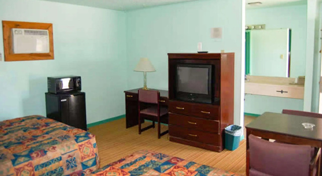 Четырёхместный номер Standard American Inn & Suites Childress