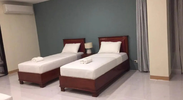 Postel ve společném pokoji Bohol Ecotel