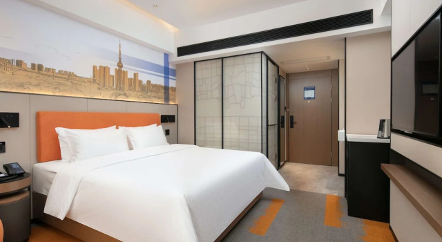 Номер Comfort Hampton by Hilton Foshan Dali