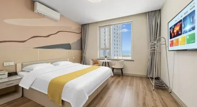 Люкс с 2 комнатами с видом на море Weihai Wanghaige Seaview Apartment (Huoju 8th Street/International Bathing Beach)