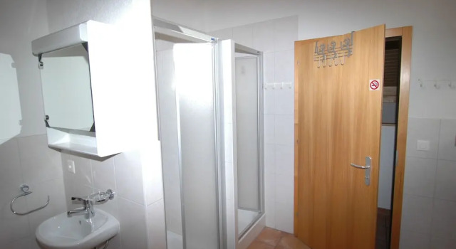 Кровать в общем номере Gîte la Cigale