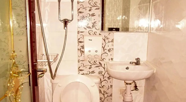 Номер Deluxe Pay-Less Guesthouse