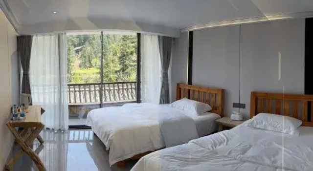 Кровать в общем номере Leishan Lang de Shangzhai Panoramic youth Hostel