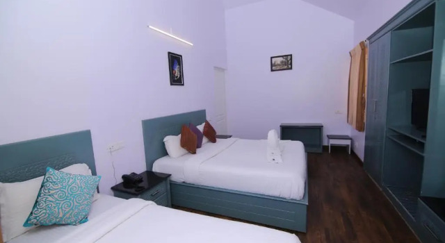 Трёхместный номер Executive Delightz Inn