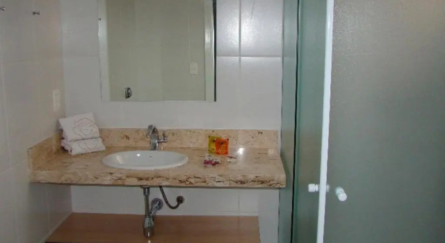 Четырёхместный номер Standard Hotel Rosa da Ilha Guaruja - 80m do mar, 02 piscinas, sala de jogos, brinquedão de percurso para crianças