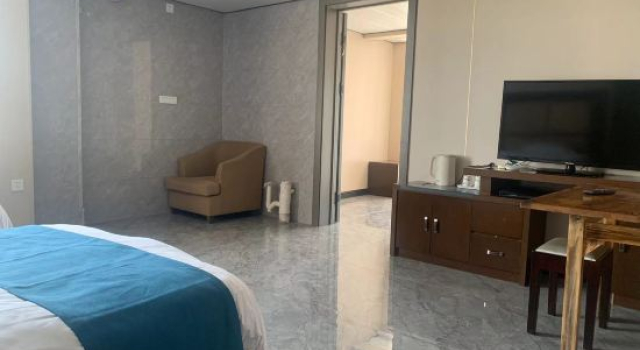 Люкс Deluxe Wanjuxing Hotel in Xiwu Banne