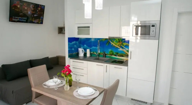Студия Apartments Sun Dance with heated Pool