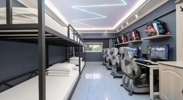 Кровать в общем номере Aibo E-sports Hotel (Taiyuan Zhongzheng Branch)