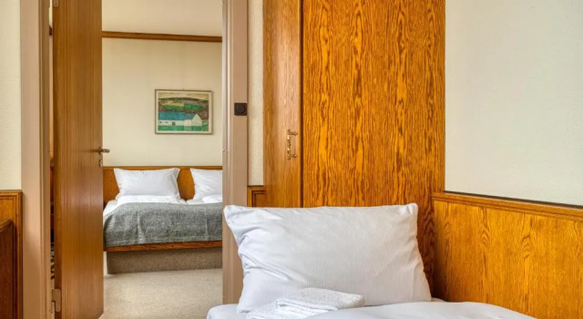 Кровать в общем номере FF&E Hotel Dania