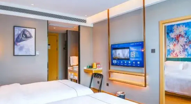 Люкс Deluxe Magnotel Hotel (Yantai Penglai Bus Station Dengzhou Road)