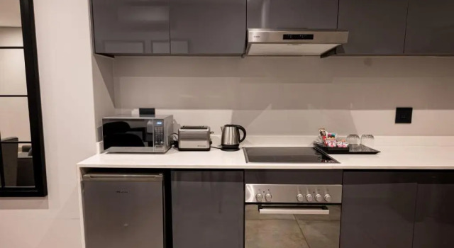 Апартаменты The Catalyst Apartment Hotel by NEWMARK