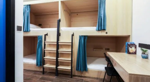 Четырёхместный семейный люкс Zou Qu Ye Travel Hotel