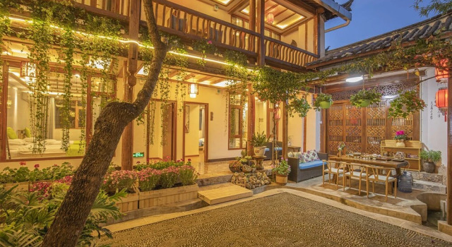 Wolong Inn, Забронировать Отель Лицзян Юньнань, рядом с Улица Сквер-стрит Древнего города Даянь