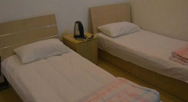 Qingdao Guanglongju Inn, Забронировать Отель Shibei District Циндао