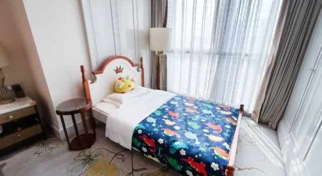 Трёхместный семейный люкс Xi'an Jue Vu Hotel