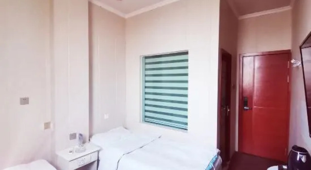 Кровать в общем номере (мужской номер) Yecheng Jinsha Business Hotel