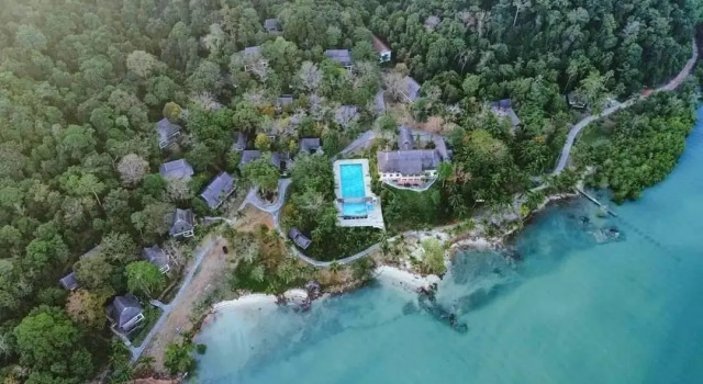 Кровать в общем номере Kooncharaburi Resort Spa and Sailling Club Koh Chang