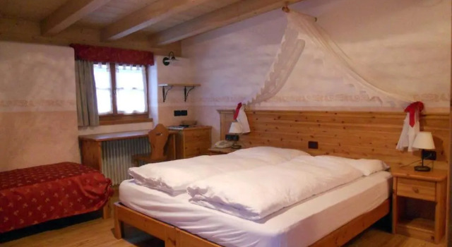 Четырёхместный номер Standard Мансарда Hotel Garnì Salvanel