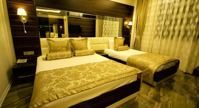 Трёхместный номер Venus Suite Hotel