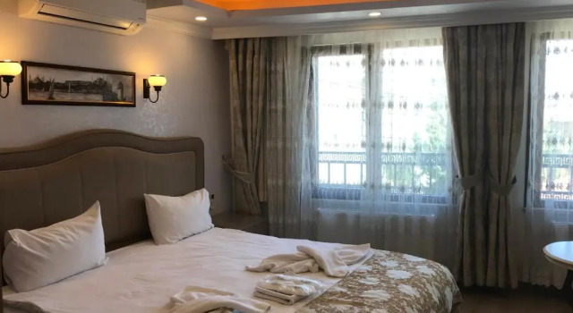 Четырёхместный номер Comfort Harbour Suites Old City