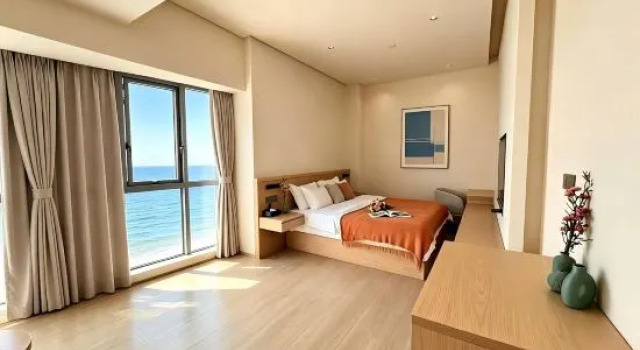 Семейный люкс с видом на море Chenhui Business Hotel (Hainan International Convention and Exhibition Center)