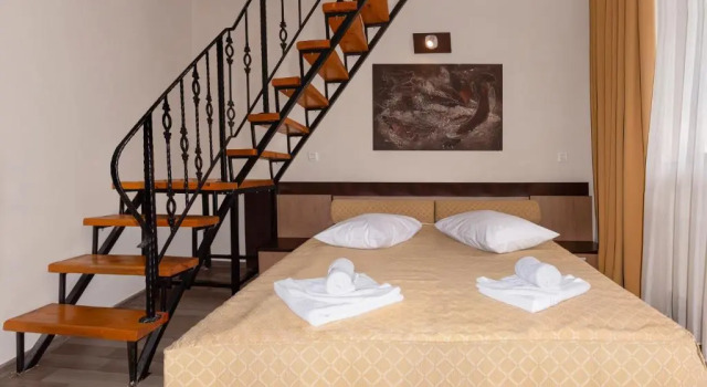 Standardní Čtyřlůžkový mezonetový pokoj Hotel Grand