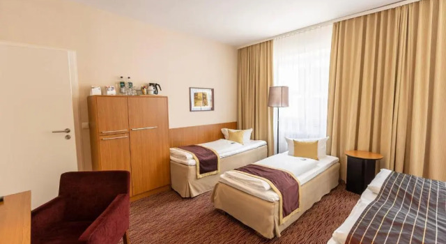 Четырёхместный номер Comfort Hotel tom Kyle