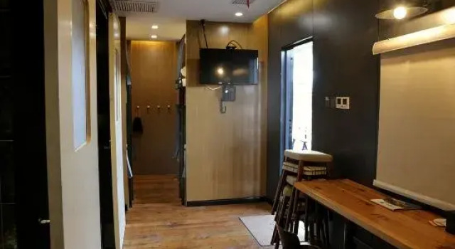 Кровать в общем номере Jiangnan Red Village Stay