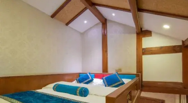 Jiuqi Fuxiang Inn (Lijiang Ancient City Dashuiche Branch), Забронировать Отель Лицзян Юньнань, рядом с Улица Сквер-стрит Древнего города Даянь