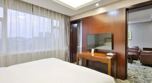 Полулюкс Executive Meihekou Hotel