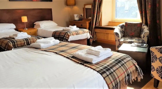 Четырёхместный семейный люкс с видом на море The Harbour House Hotel