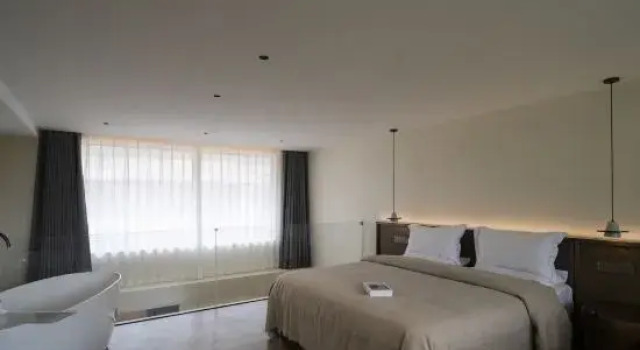 Двухместный семейный люкс Дуплекс с видом на внутренний двор Yulong Mujianshan Homestay