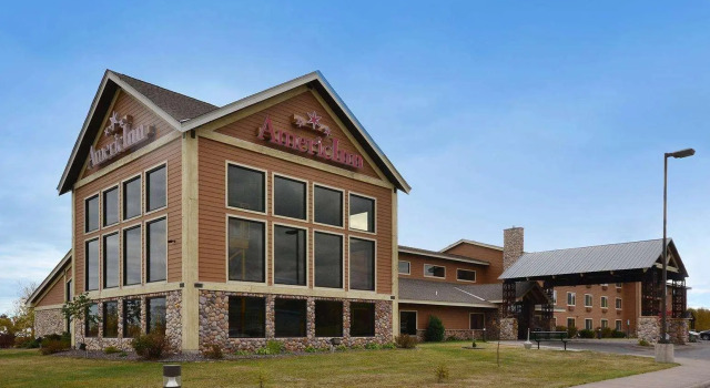 Кровать в общем номере Black Beach Inn by GrandStay