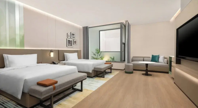 Четырёхместный номер Premium Holiday Inn & Suites Shanghai Changfeng by IHG