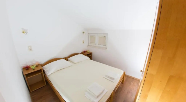 Апартаменты с 2 комнатами с балконом и с видом на море Apartments Ticinovic