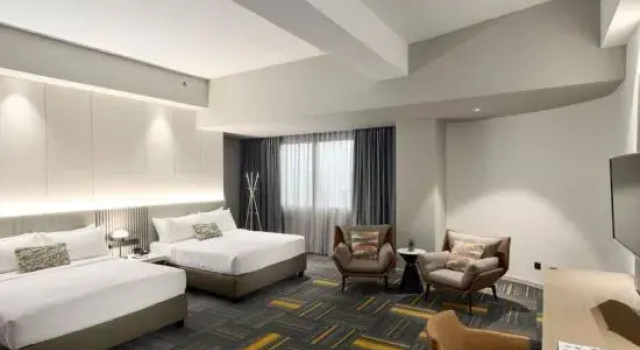 Четырёхместный номер Executive RELC International Hotel
