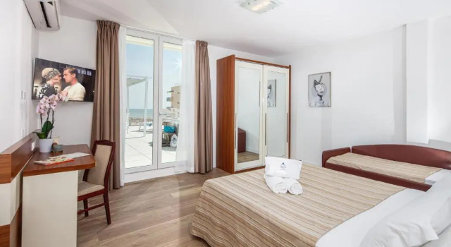Четырёхместный номер Comfort Hotel Danieli