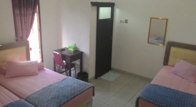 Losmen Ibu Hj. Tarjo, Rezervovat Hotel Palembang Sumatra