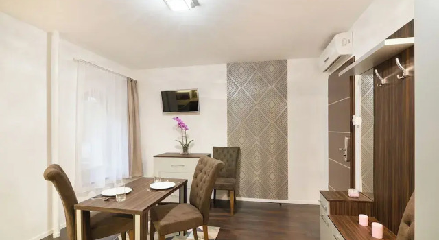 Апартаменты Paulay Downtown Apartments