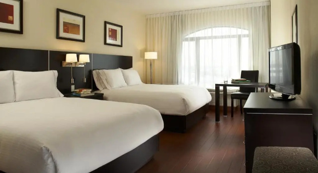 Четырёхместный номер Deluxe Holiday Inn & Suites Montreal Airport by IHG